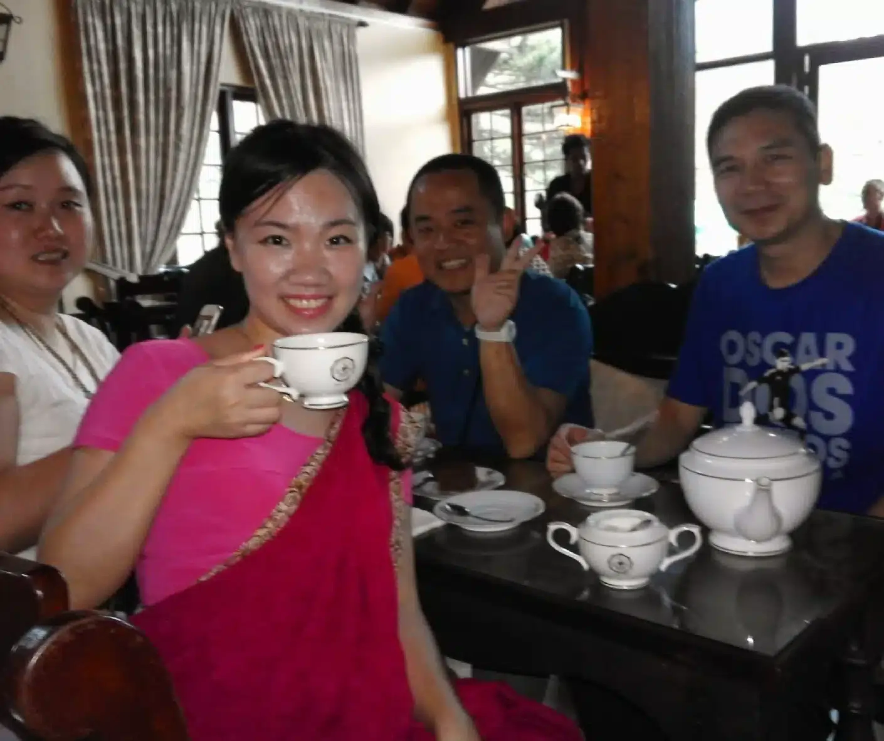 Tour group enjoying tea in Sri Lanka