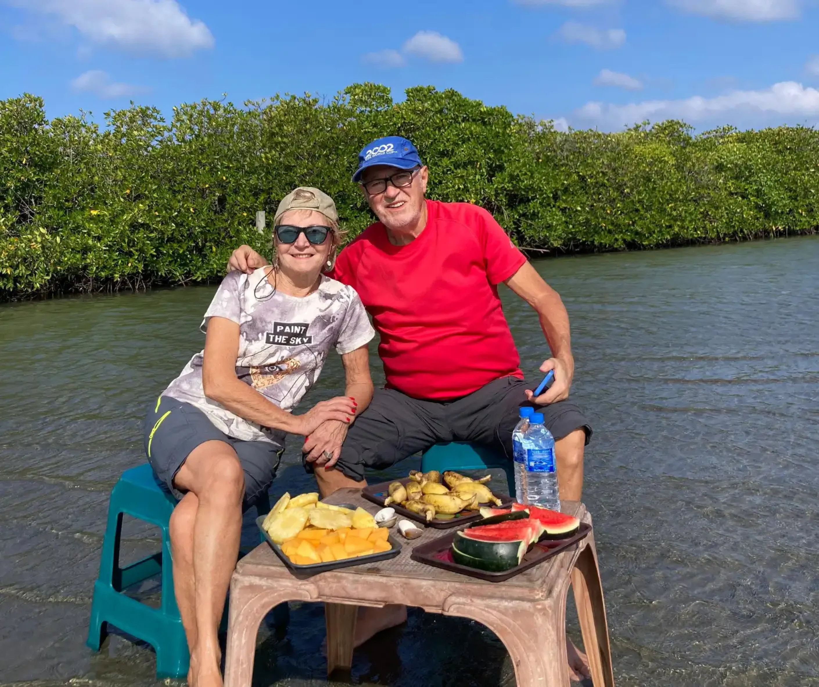 Toursists Eating Fruits At Negombo Lagoon Boat Ride Sri Lanka