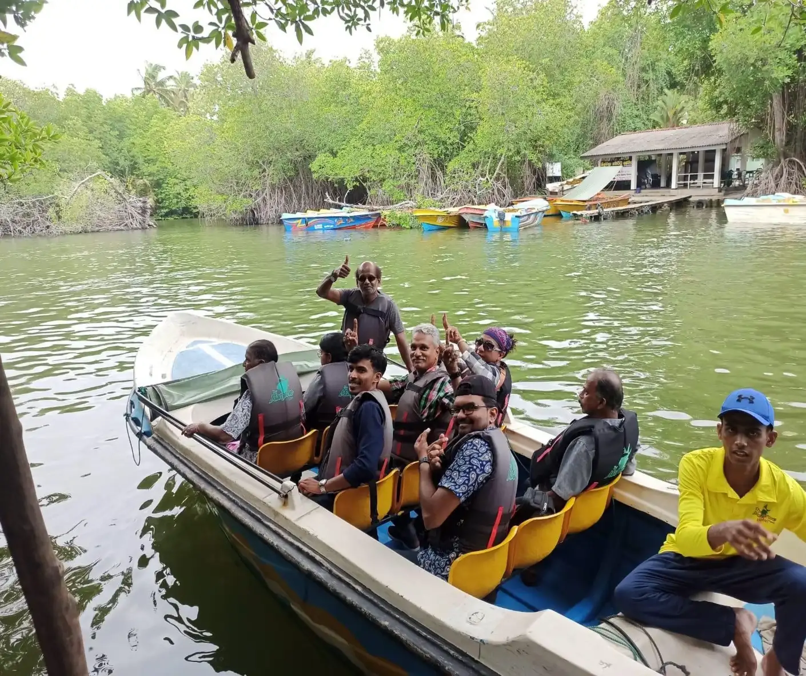 Travel group on Madu river safari in Sri Lanka