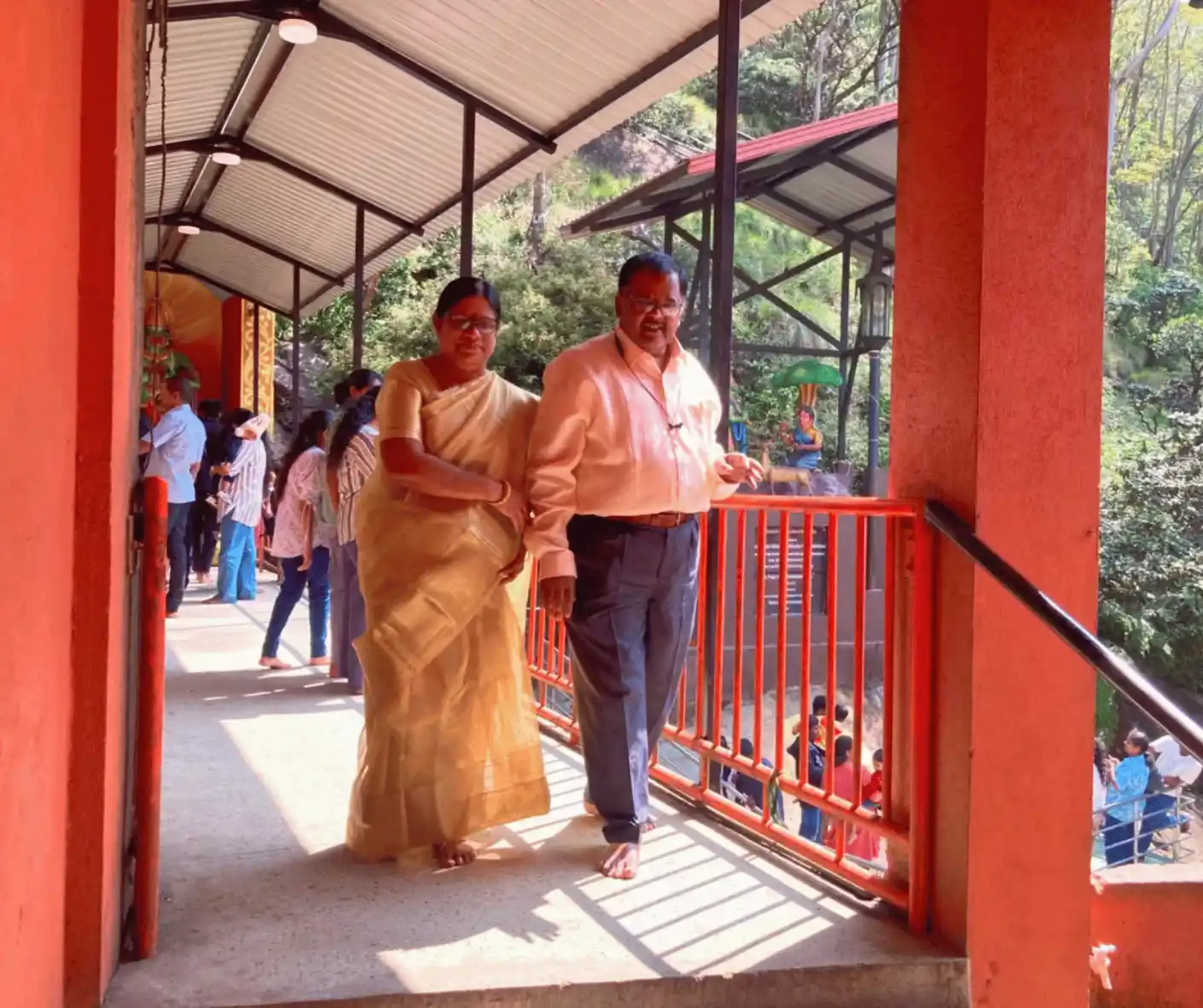 tourist travel couple from india traveling sri lanka trip in nuwara eliya seetha amman temple hanuman footprint