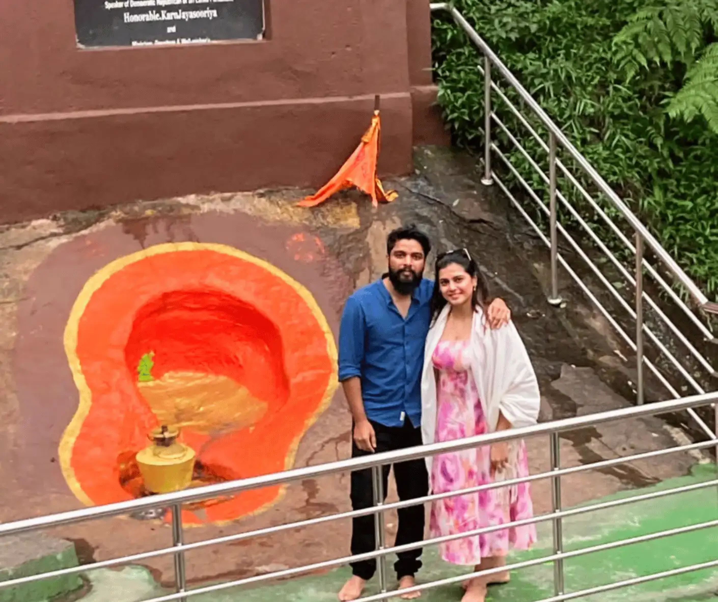 tourist travel couple from malaysia traveling sri lanka trip in nuwara eliya seetha amman temple hanuman footprint