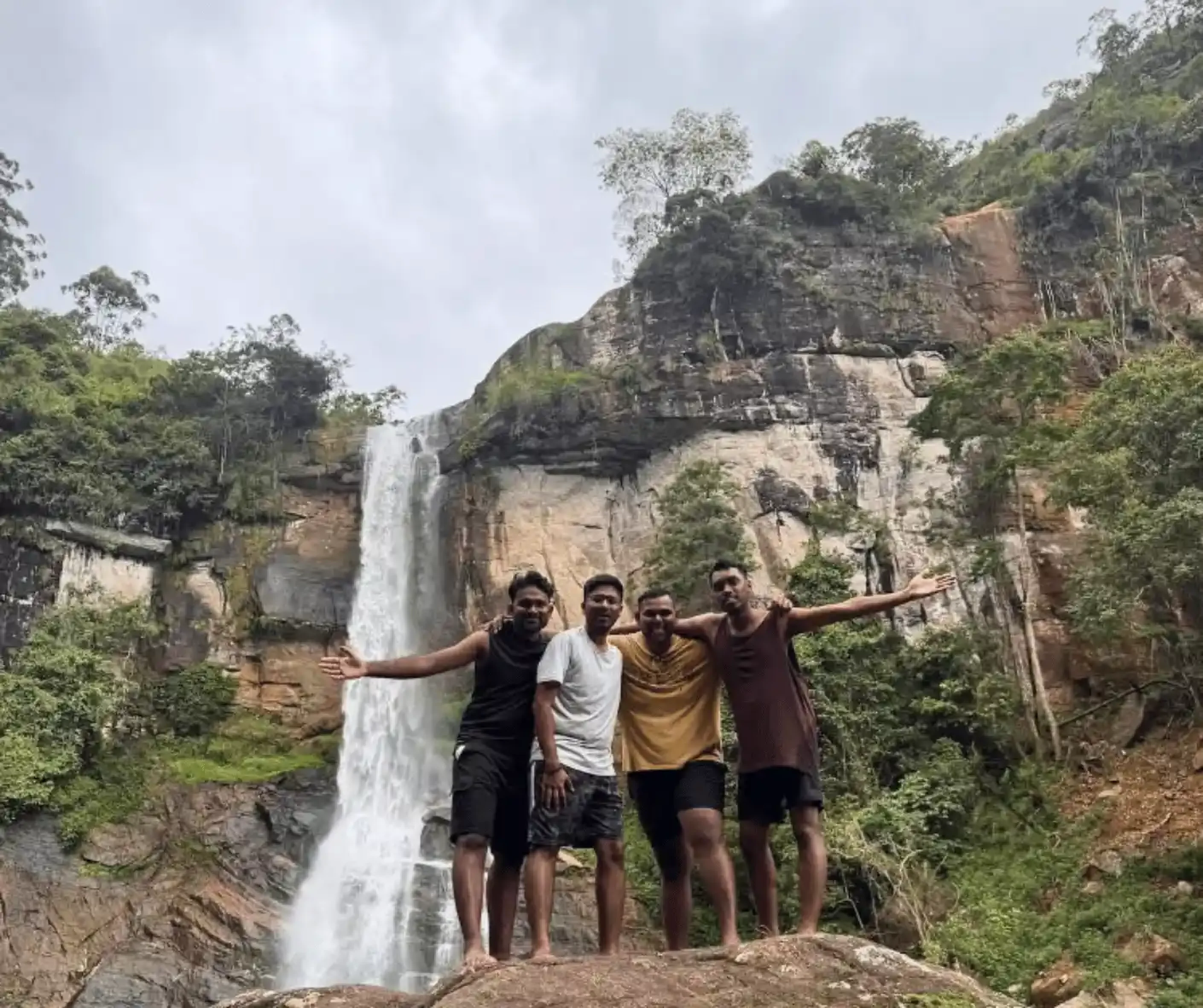 tourist travel friend group from malaysia traveling sri lanka trip in ramboda waterfall